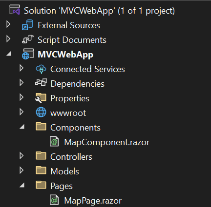 Web browser showing ASP.NET MVC home page with embedded GeoBlazor map displaying US counties